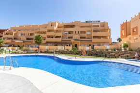 Bajo con Jardin y Piscina cerca de la Playa Dos Dormitorios